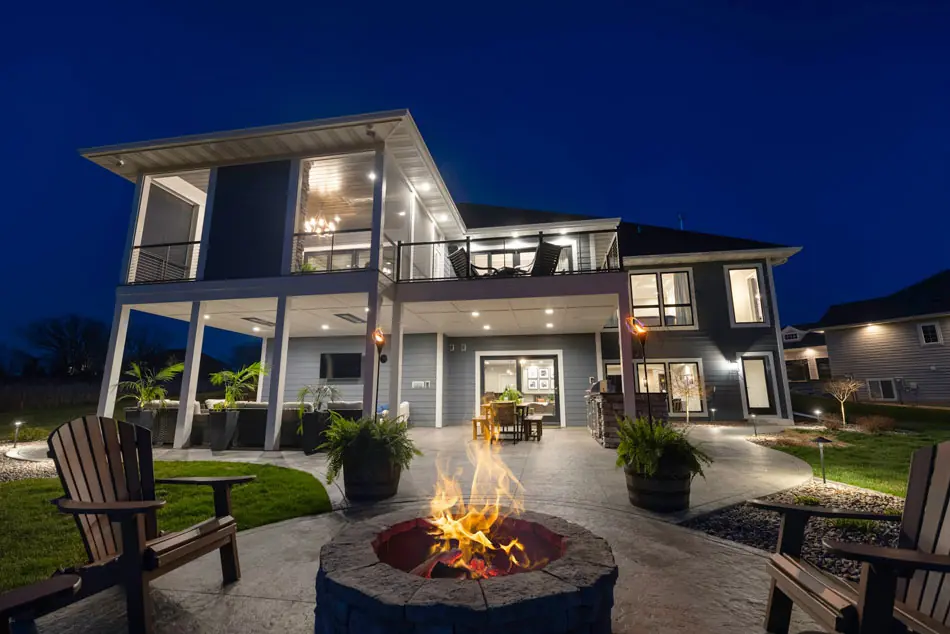 A modern home with outdoor lighting